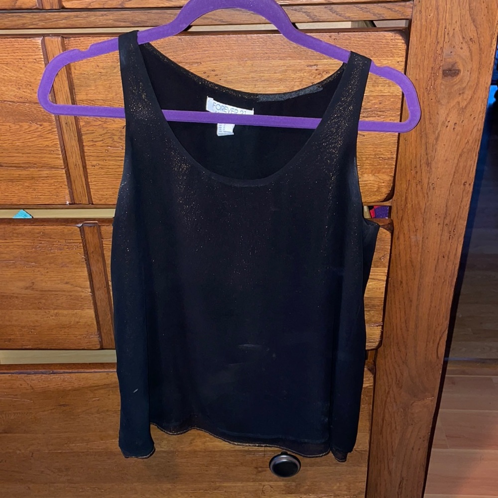 Black top with gold underneath